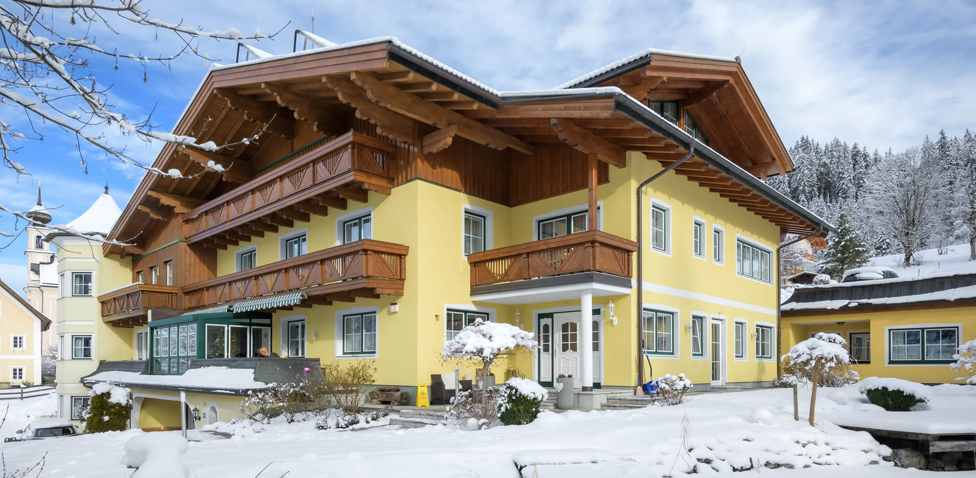 Hotel-Garni Haus am Hammerrain in Flachau - Zimmer und Appartements in zentraler, sonniger Lage